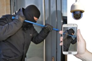 A burglar attempting to break into a property while the owner receives an alert on his smartphone via CCTV, illustrating effective crime prevention measures.